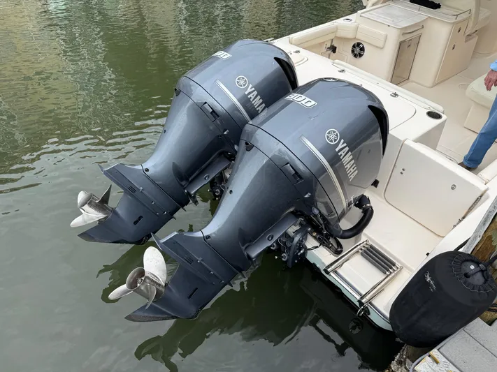 Tranquility Yacht Photos Pics 2021 Grady-White Freedom 285 with twin Yamaha outboard motors on water.