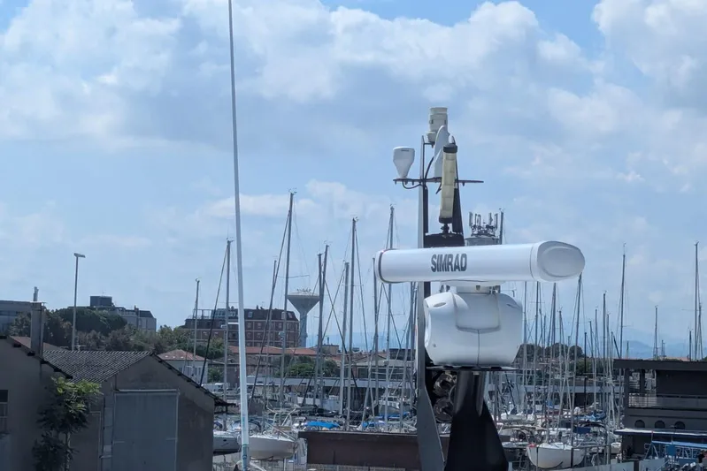  Yacht Photos Pics Radar equipment on a 2022 Sunseeker Predator 55 EVO yacht in a marina setting.