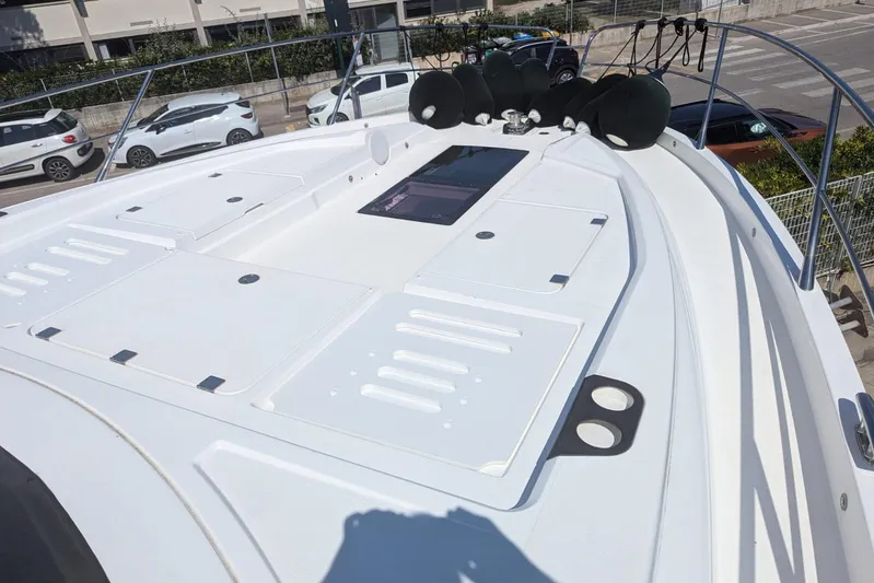  Yacht Photos Pics Sunseeker Predator 55 EVO 2022 yacht deck, featuring sleek design and modern fittings.