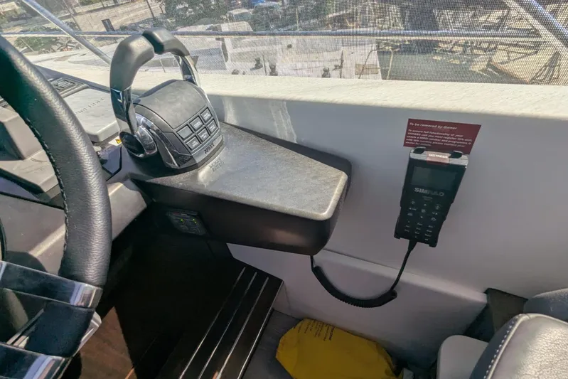  Yacht Photos Pics Control panel of 2022 Sunseeker Predator 55 EVO yacht, featuring advanced navigation equipment.