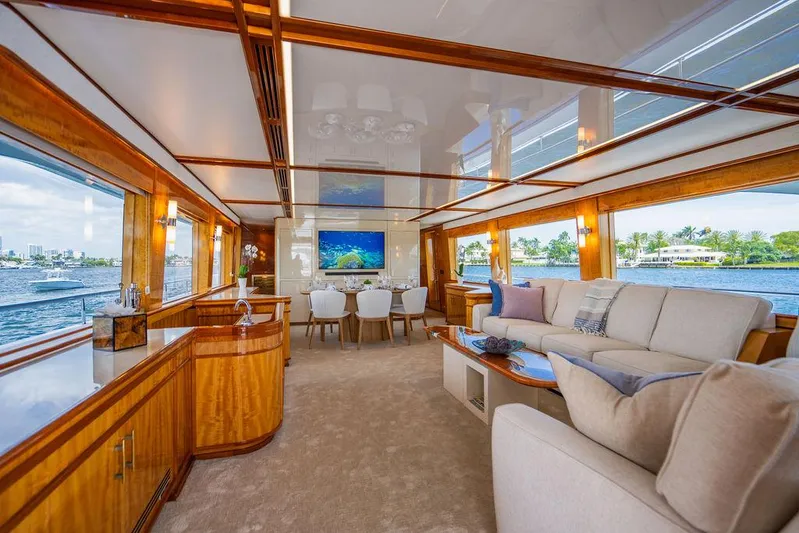 Carpe Diem Yacht Photos Pics Luxurious interior of 2001 Intermarine Raised Pilothouse yacht with elegant furnishings and waterfront views.