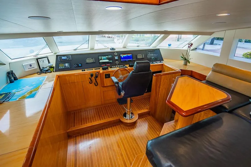 Carpe Diem Yacht Photos Pics Pilothouse of a 2001 Intermarine Raised Pilothouse yacht with modern navigation equipment.