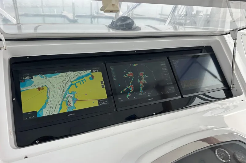  Yacht Photos Pics 2001 Viking 55 Convertible yacht dashboard with Garmin navigation displays.