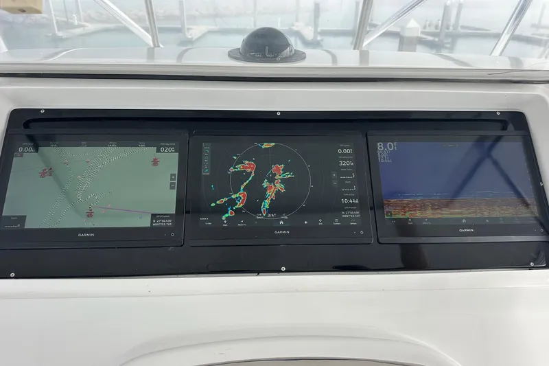  Yacht Photos Pics Garmin navigation displays on 2001 Viking 55 Convertible yacht dashboard.