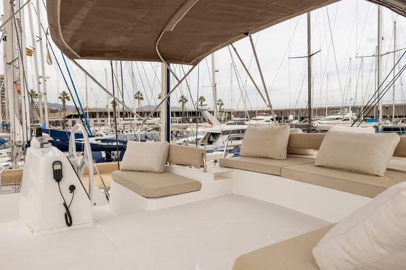 Tatani Yacht Photos Pics Luxurious 2021 Bali 4.8 yacht interior with comfortable seating and marina view.