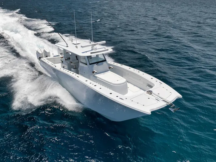 Sycorax Yacht Photos Pics 2024 Freeman 43 CC boat cruising on open ocean waters.