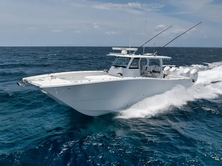 Sycorax Yacht Photos Pics 2024 Freeman 43 CC boat cruising on open ocean waters.