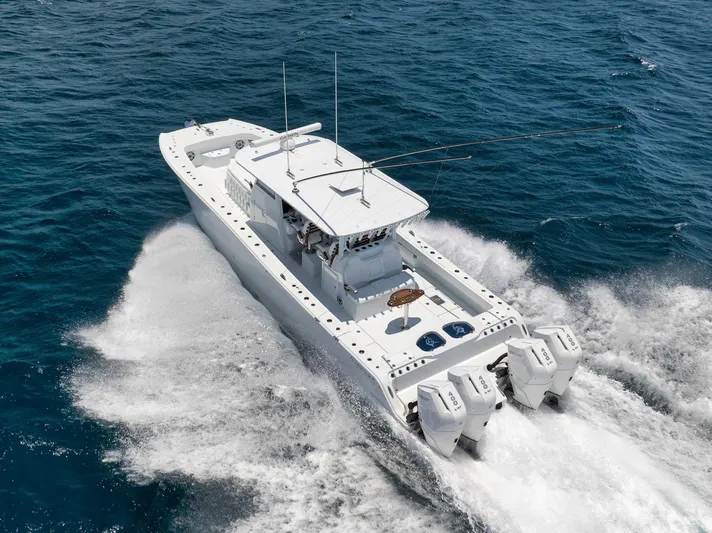 Sycorax Yacht Photos Pics 2024 Freeman 43 CC boat cruising on open ocean waters.