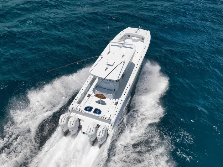 Sycorax Yacht Photos Pics 2024 Freeman 43 CC boat cruising on open ocean waters.