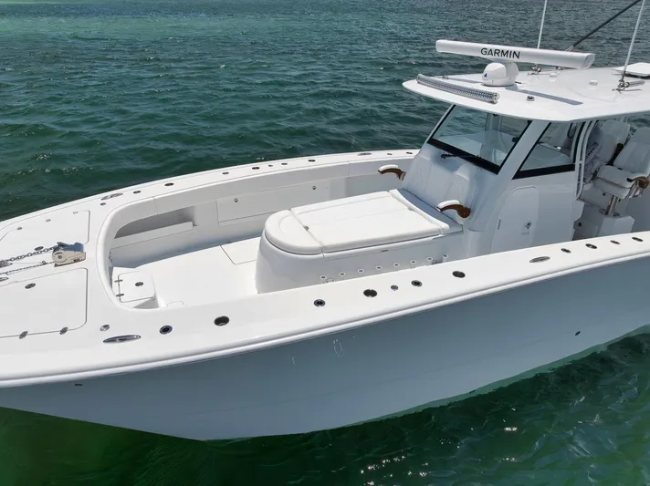 Sycorax Yacht Photos Pics 2024 Freeman 43 CC boat on water, featuring sleek design and advanced Garmin navigation system.