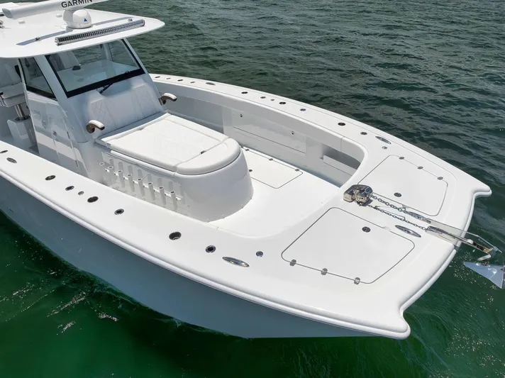 Sycorax Yacht Photos Pics 2024 Freeman 43 CC boat on water, featuring sleek design and spacious deck.