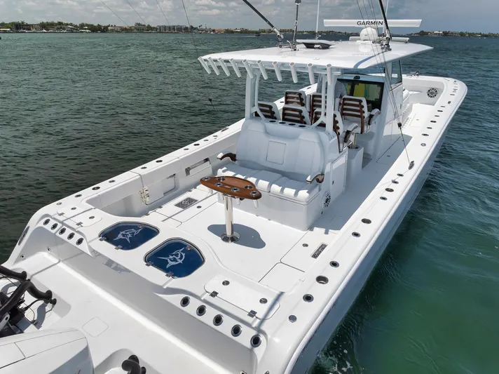 Sycorax Yacht Photos Pics 2024 Freeman 43 CC boat on water, featuring spacious deck and modern design.