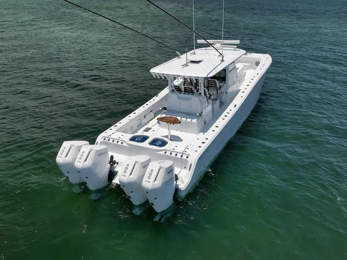 Sycorax Yacht Photos Pics 2024 Freeman 43 CC boat with quad engines on open water.