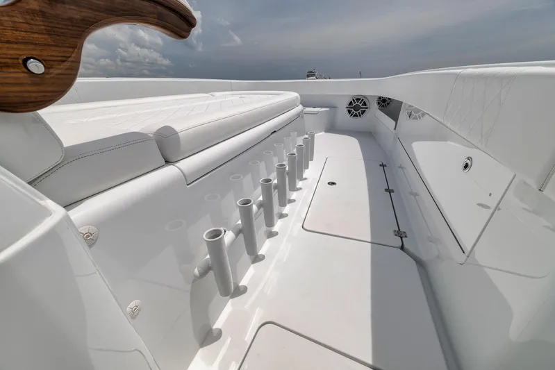 Sycorax Yacht Photos Pics 2024 Freeman 43 CC boat interior with rod holders and seating.