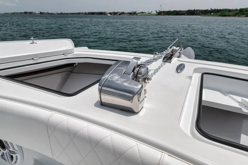 Sycorax Yacht Photos Pics 2024 Freeman 43 CC boat deck with anchor chain and storage compartments.