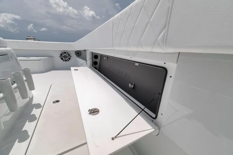 Sycorax Yacht Photos Pics 2024 Freeman 43 CC boat interior with open storage compartment and sleek white design.