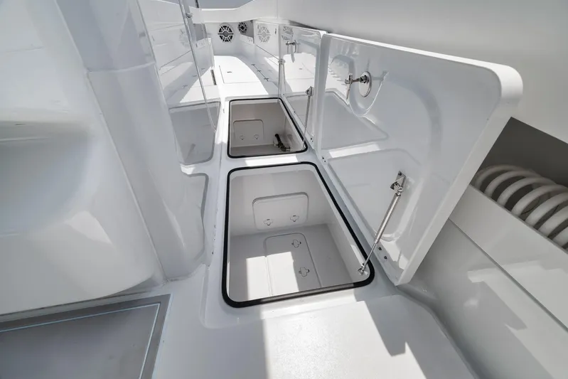 Sycorax Yacht Photos Pics 2024 Freeman 43 CC boat interior with open storage compartments.