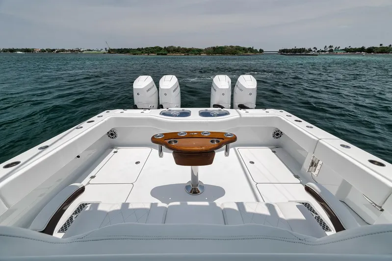 Sycorax Yacht Photos Pics 2024 Freeman 43 CC boat with four engines, spacious deck, and scenic ocean view.