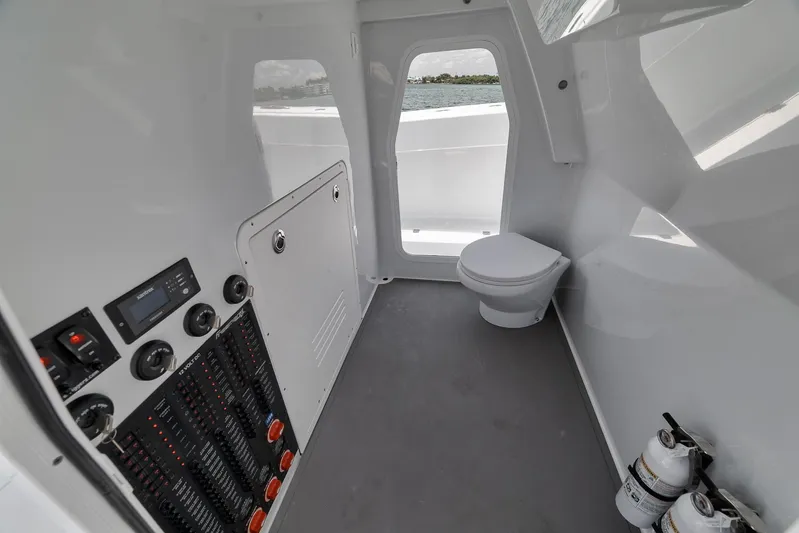 Sycorax Yacht Photos Pics 2024 Freeman 43 CC boat interior with control panel and toilet.