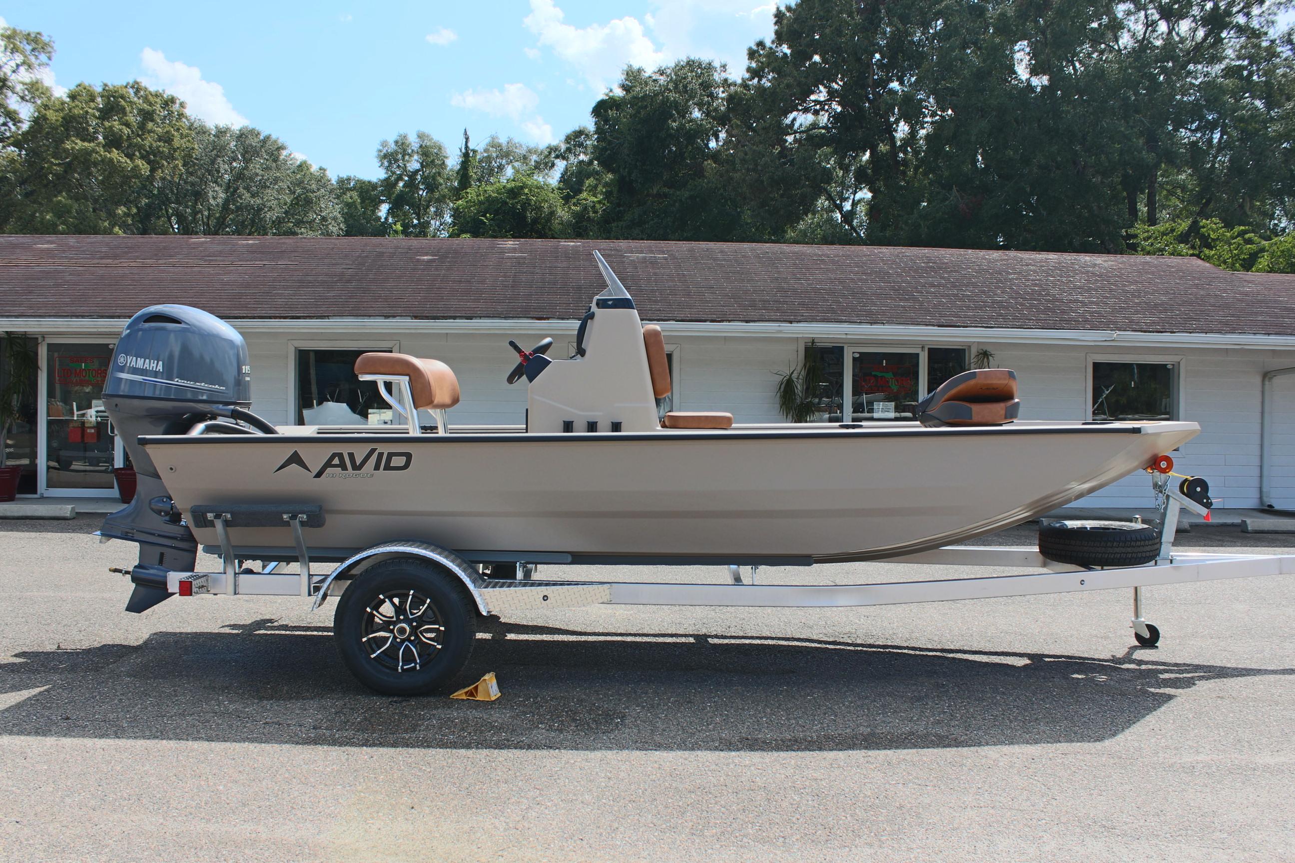2025 Avid 18 Rogue CC boat on trailer, parked outdoors.