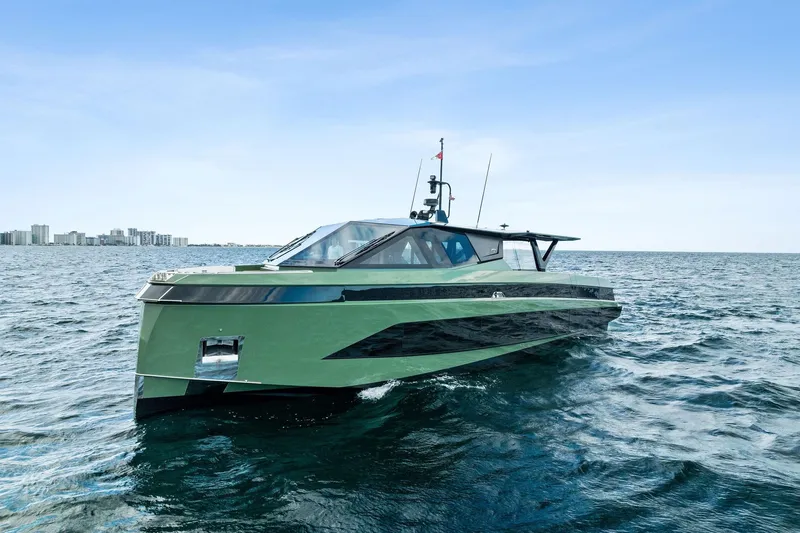 Another World Yacht Photos Pics 2025 Wally Wallytender 100 yacht cruising on open water under clear skies.