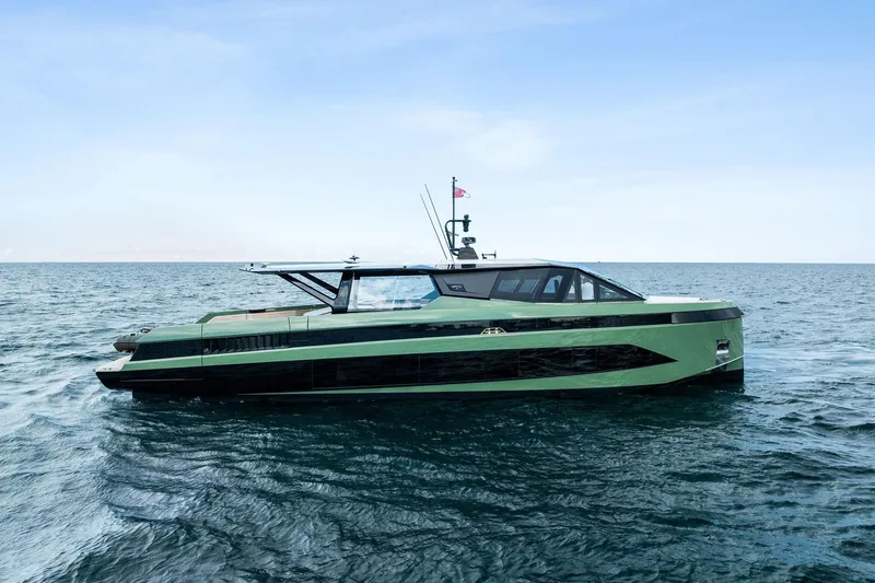 Another World Yacht Photos Pics 2025 Wally Wallytender 100 yacht on open sea, sleek design, modern luxury vessel.
