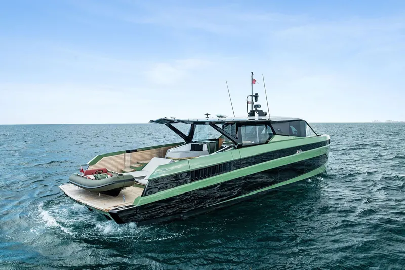 Another World Yacht Photos Pics 2025 Wally Wallytender 100 yacht cruising on open sea, sleek design, modern luxury.