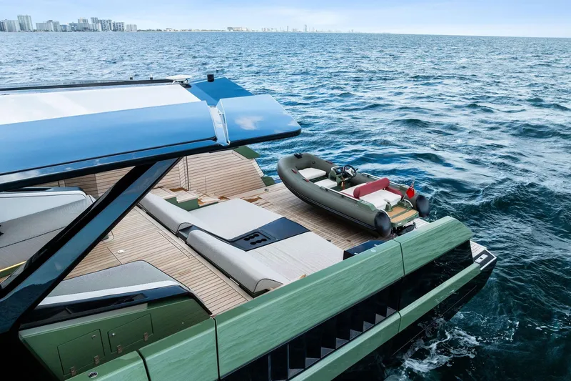 Another World Yacht Photos Pics Luxury Wallytender 100 yacht on open sea, featuring sleek design and spacious deck, 2025 model.