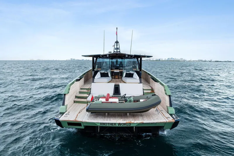 Another World Yacht Photos Pics 2025 Wally Wallytender 100 yacht on open sea, showcasing sleek design and luxury features.