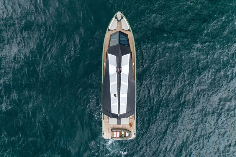 Another World Yacht Photos Pics Aerial view of 2025 Wally Wallytender 100 yacht on open water.