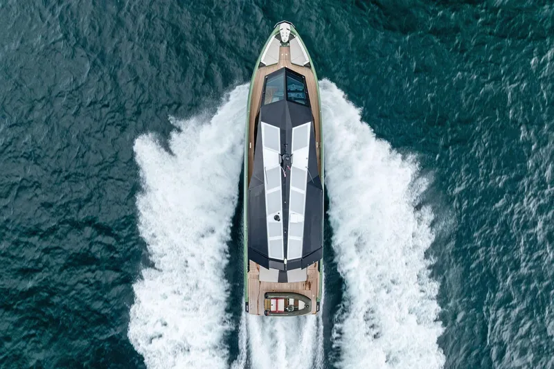 Another World Yacht Photos Pics Aerial view of 2025 Wally Wallytender 100 yacht cruising on open water.