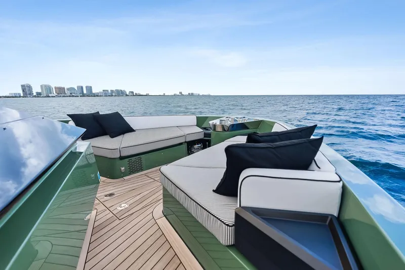 Another World Yacht Photos Pics Luxurious 2025 Wally Wallytender 100 yacht with elegant seating, ocean view, and city skyline.