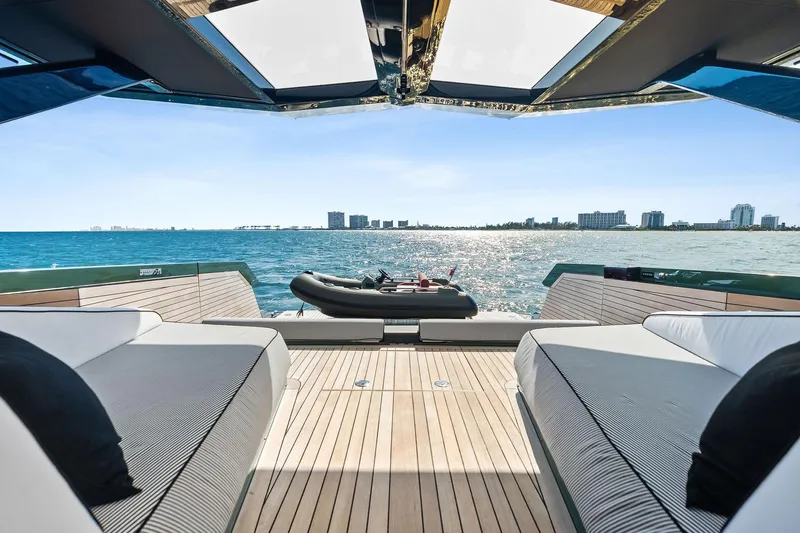 Another World Yacht Photos Pics Luxurious 2025 Wally Wallytender 100 yacht interior with ocean view and city skyline.