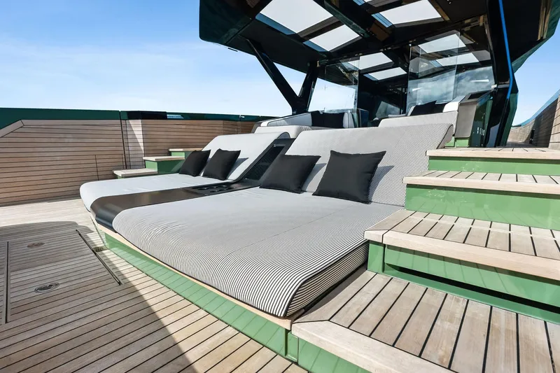 Another World Yacht Photos Pics Luxurious deck seating on 2025 Wally Wallytender 100 yacht with modern design.