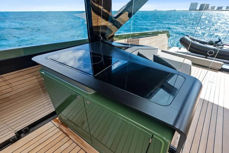 Another World Yacht Photos Pics Luxury Wallytender 100 yacht kitchen area with sleek design, ocean view, 2025 model.