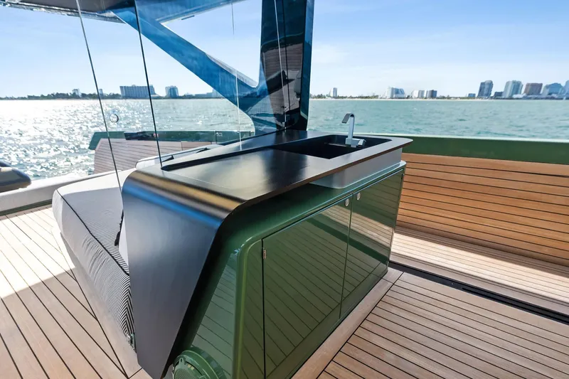 Another World Yacht Photos Pics Luxury deck of 2025 Wally Wallytender 100 yacht with sleek outdoor kitchen.