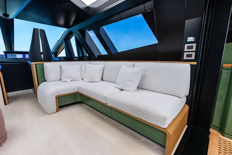 Another World Yacht Photos Pics Luxurious interior of 2025 Wally Wallytender 100 yacht with modern seating.