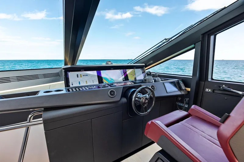 Another World Yacht Photos Pics Modern helm of 2025 Wally Wallytender 100 yacht with advanced navigation systems.