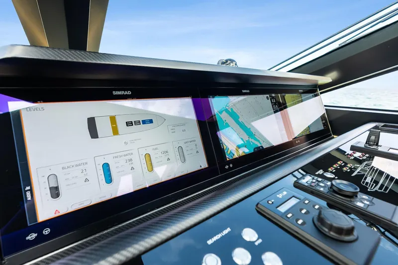 Another World Yacht Photos Pics Control panel of 2025 Wally Wallytender 100 yacht with navigation screens.