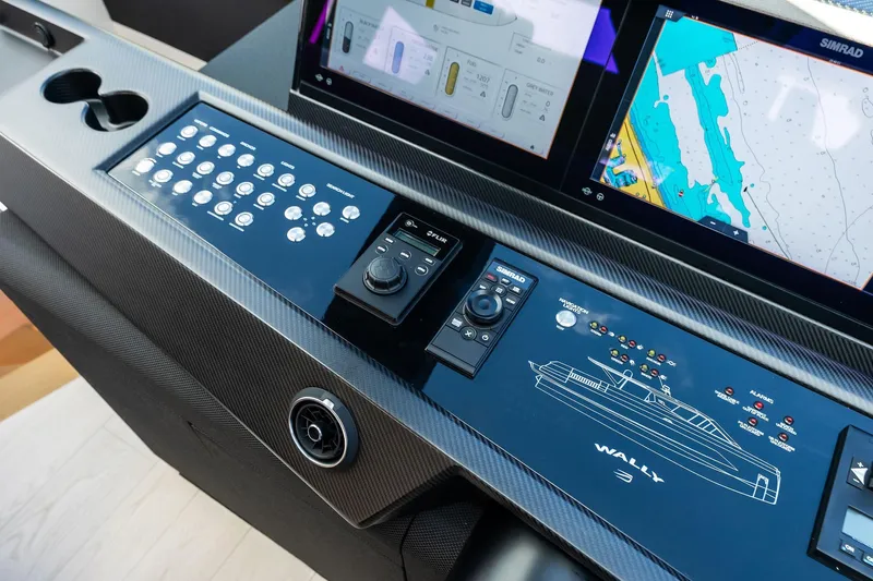 Another World Yacht Photos Pics Control panel of 2025 Wally Wallytender 100 yacht with navigation screens and controls.