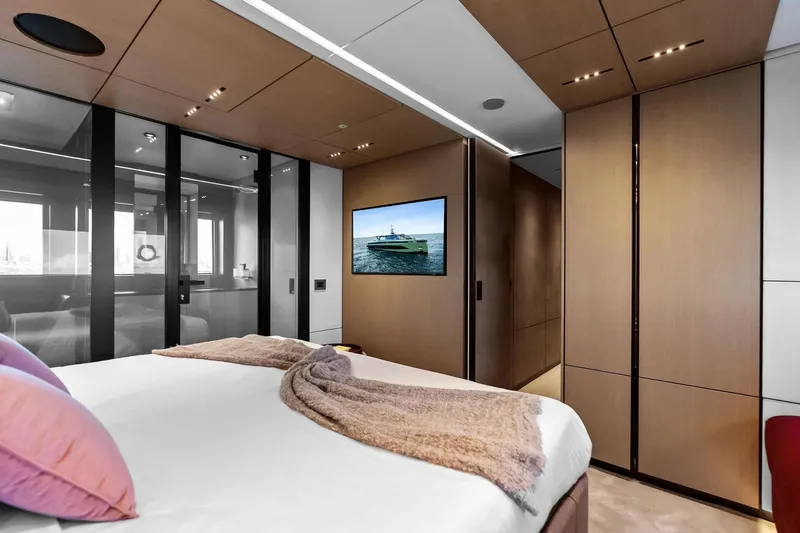 Another World Yacht Photos Pics Luxurious interior of 2025 Wally Wallytender 100 yacht bedroom with modern design elements.