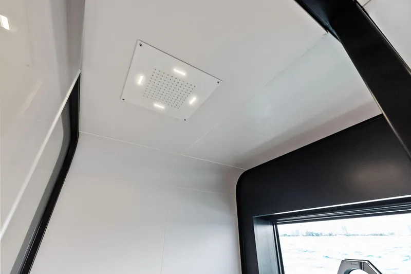 Another World Yacht Photos Pics Interior view of 2025 Wally Wallytender 100 yacht, featuring modern ceiling design.