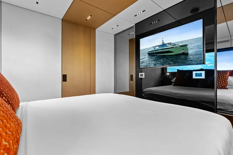 Another World Yacht Photos Pics Luxurious bedroom interior on 2025 Wally Wallytender 100 yacht with modern design elements.