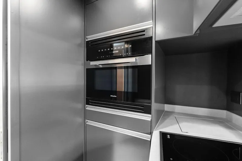 Another World Yacht Photos Pics Modern kitchen appliances in the 2025 Wally Wallytender 100 yacht interior.
