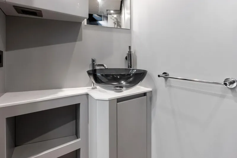 Another World Yacht Photos Pics Modern bathroom interior on 2025 Wally Wallytender 100 yacht, featuring sleek design elements.