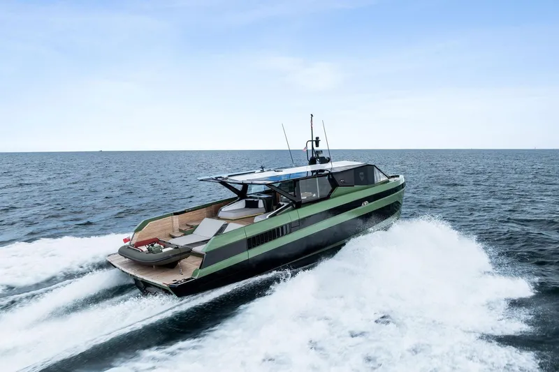 Another World Yacht Photos Pics 2025 Wally Wallytender 100 yacht cruising on open sea under clear blue sky.
