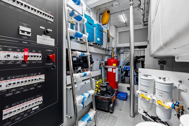Another World Yacht Photos Pics Engine room of 2025 Wally Wallytender 100, featuring control panels and equipment.