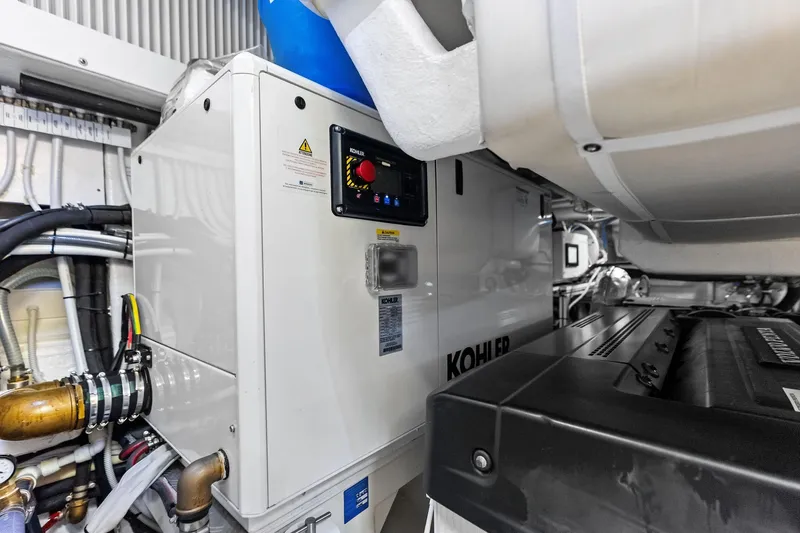 Another World Yacht Photos Pics Engine room of 2025 Wally Wallytender 100 featuring Kohler generator and machinery.
