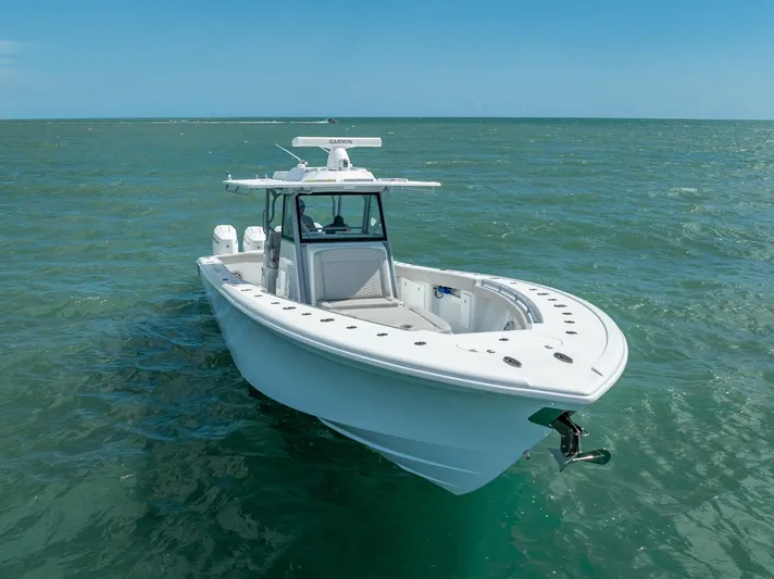  Yacht Photos Pics 2024 Yellowfin 39 boat on open water, showcasing sleek design and advanced features.