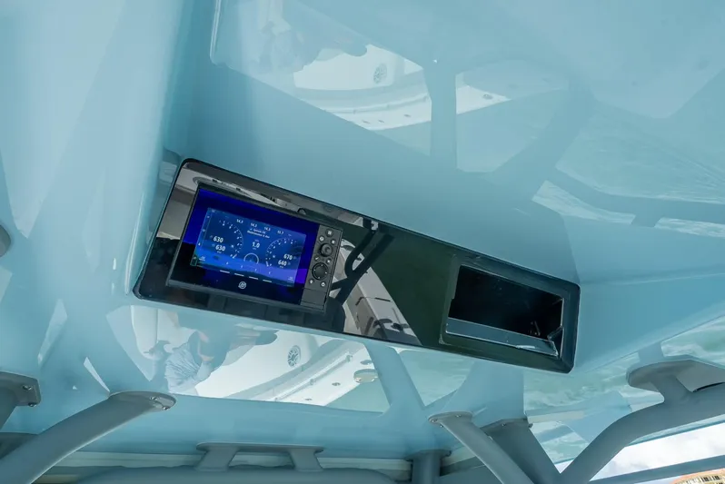  Yacht Photos Pics 2024 Yellowfin 39 boat dashboard with digital display and controls.